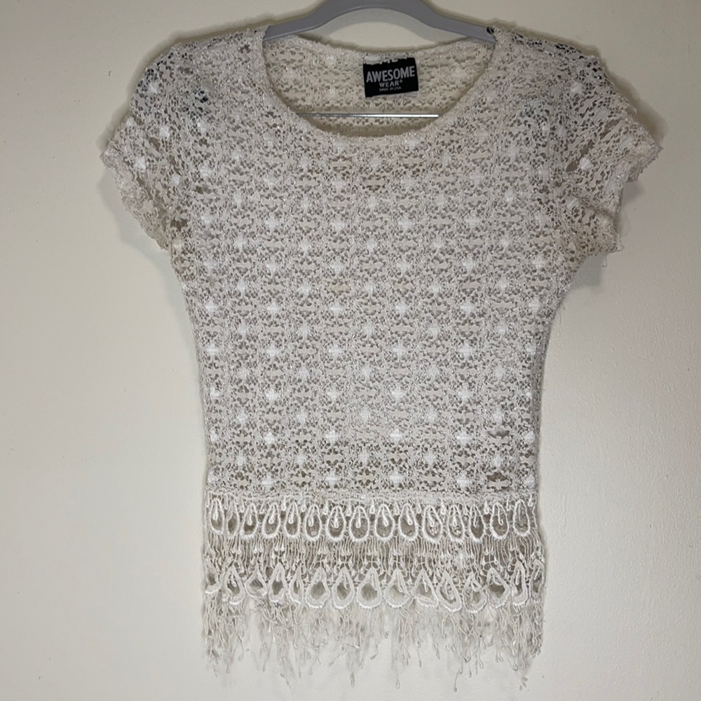 White patterned top.